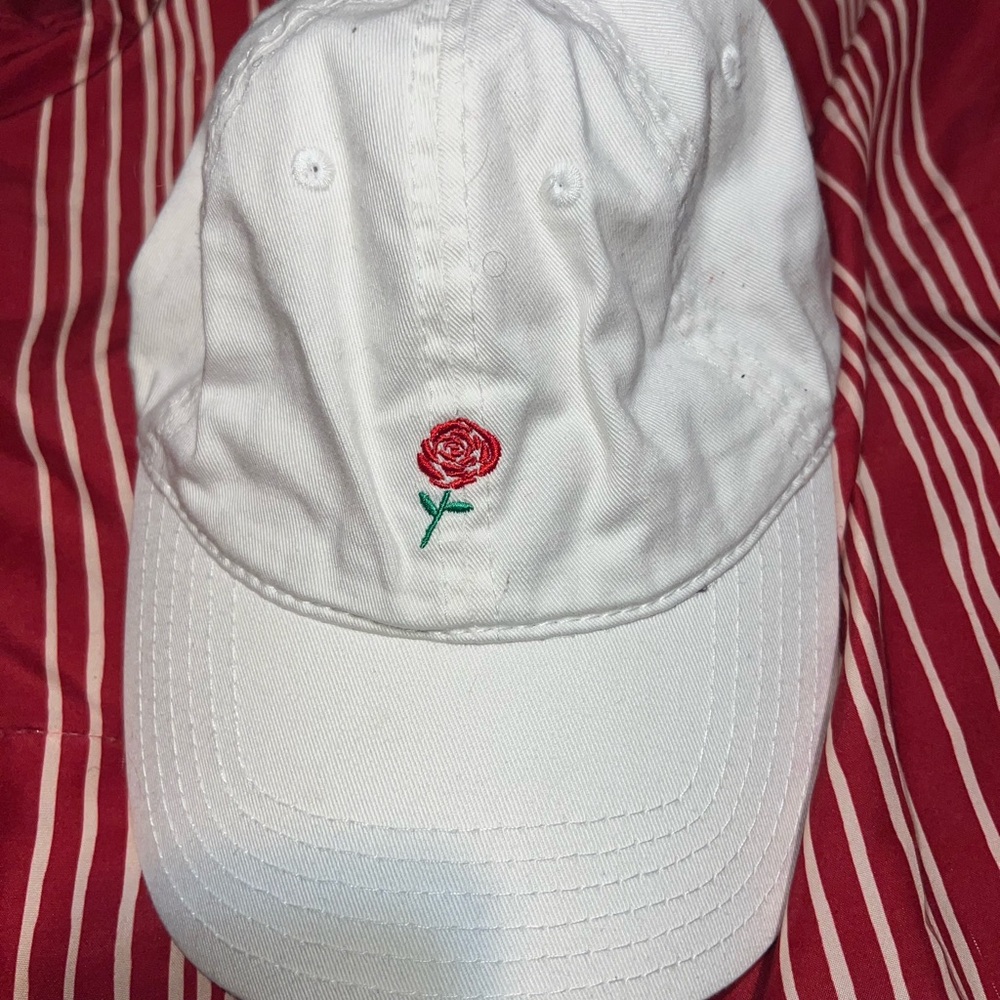 white baseball hat with rose embroidery